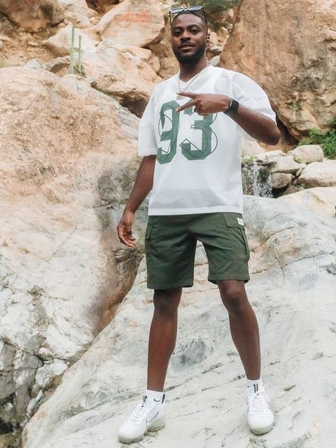 ASOS DESIGN boxy oversized t-shirt with dropped shoulder and v neck with sports graphic in ecru airtex