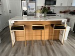 Wooden kitchen with integrated seating area